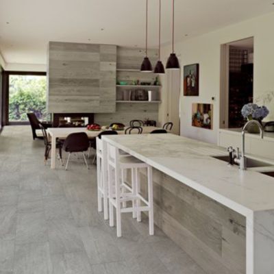 tile floors in a large open kitchen and dining area 